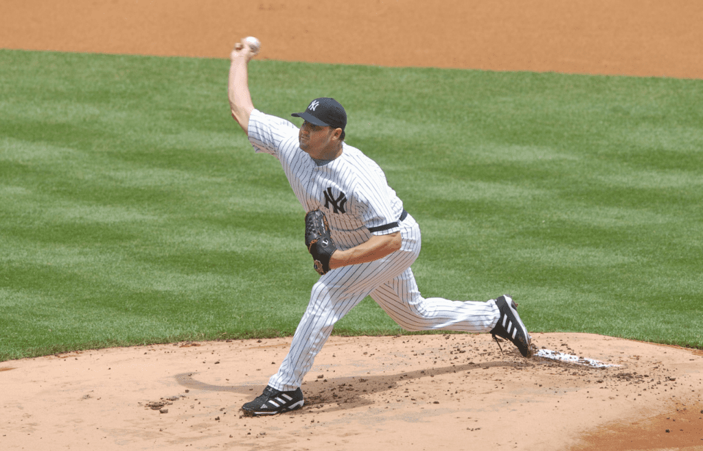 Jun 09, 2007; Bronx, NY, USA; New York Yankees pitcher (22) Roger Clemens pitches in the first inning against the Pittsburg Pirates at Yankee Stadium. Mandatory Credit: Mark J. Rebilas-Imagn Images Copyright © 2007 Mark J. Rebilas