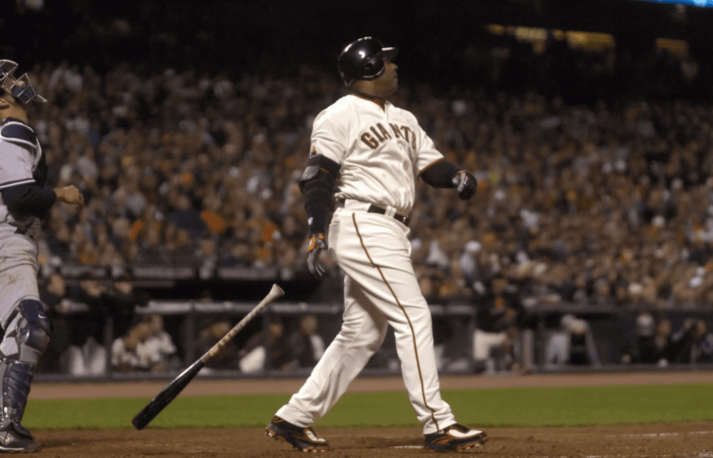 June 22, 2007; San Francisco, CA, USA; San Francisco Giants left fielder Barry Bonds (25) hits his 749th homerun off of New York Yankees relief pitcher Scott Proctor (not pictured) during the 8th inning at AT&T Park in San Francisco, CA. Bonds is seven homeruns away from breaking the all-time homerun record currently held by Hank Aaron. Mandatory Credit: Kyle Terada-Imagn Images Copyright (c) 2007 Kyle Terada