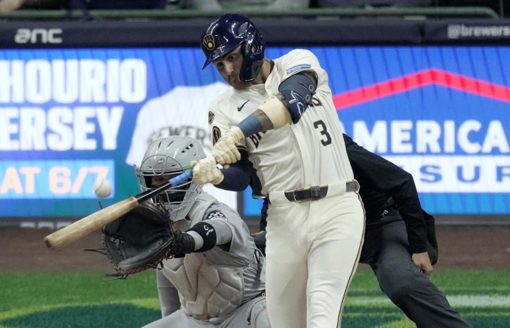Milwaukee Brewers second baseman Brice Turang (2) hits a single during the third inning of their game against the Boston Red Sox Tuesday, May 27, 2025 at American Family Field in Milwaukee, Wisconsin