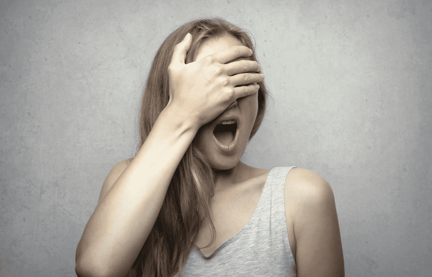 Someone gasping in surprise at dramatic news