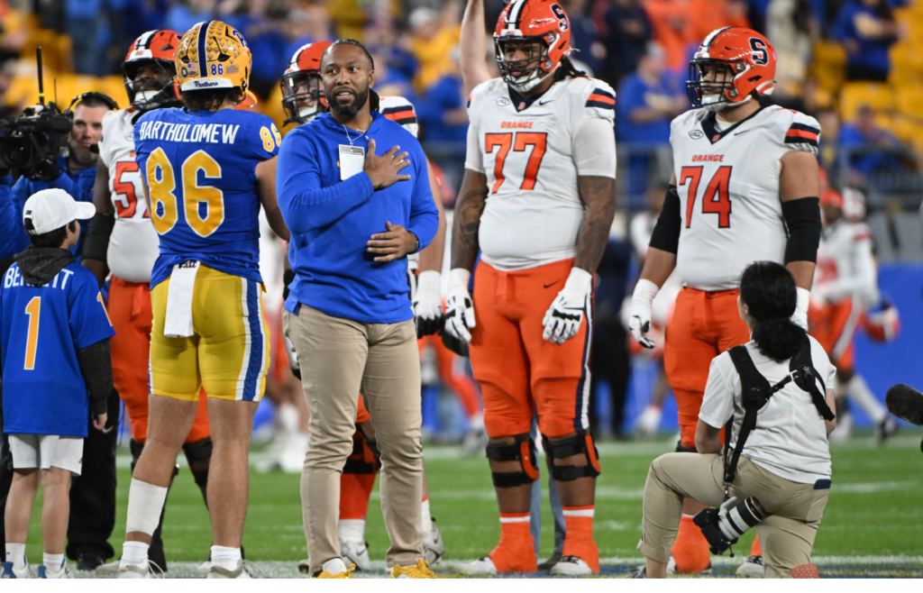 Oct 24, 2024; Pittsburgh, Pennsylvania, USA; Former Pittsburgh Panthers wide receiver Larry Fitzgerald reacts on the sideline against the Syracuse Orange during the second half at Acrisure Stadium. Mandatory Credit: Barry Reeger-Imagn Images