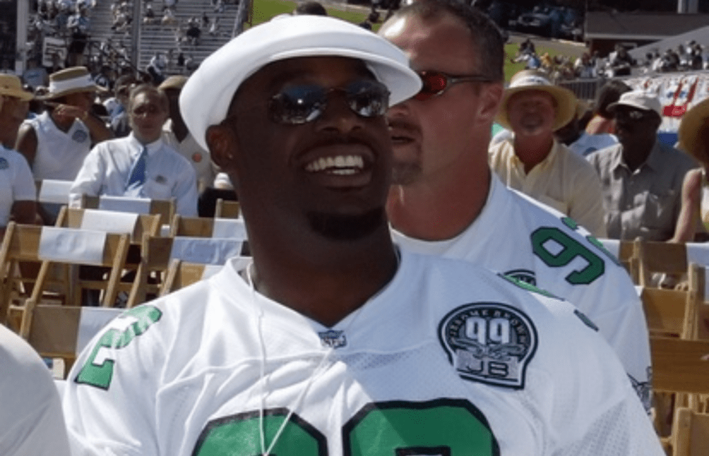 Aug 5, 2006; Canton, OH, USA; Philadelphia Eagles quarterback Donavan Mcnabb in the crowd as former Philadelphia Eagles and Green Bay Packers defensive tackle Reggie White widow Sara White speaks during his enshrinement to the Pro Football Hall of Fame at Fawcett Stadium. Mandatory Credit: Matthew Emmons-Imagn Images ? copyright Matthew Emmons