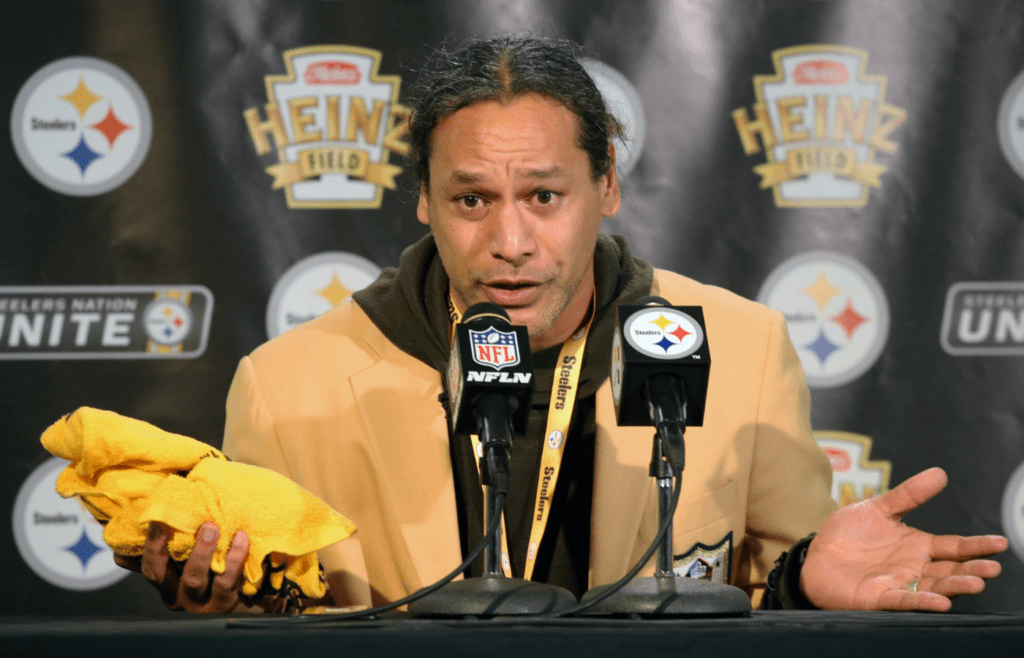 Oct 17, 2021; Pittsburgh, Pennsylvania, USA; Pittsburgh Steelers former safety and 2020 Professional Football Hall of Fame enshrinee Troy Polamalu becomes emotional as he speaks at a news conference before the Pittsburgh Steelers play the Seattle Seahawks at Heinz Field. Mandatory Credit: Charles LeClaire-Imagn Images