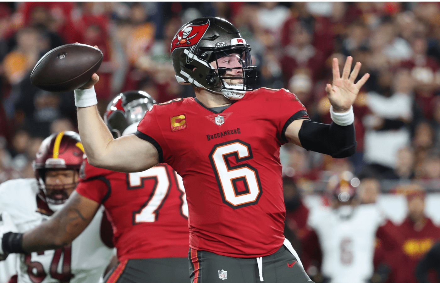 Tampa Bay Buccaneers quarterback Baker Mayfield (6) throws during the second quarter of a NFC wild card playoff against the Washington Commanders at Raymond James Stadium.