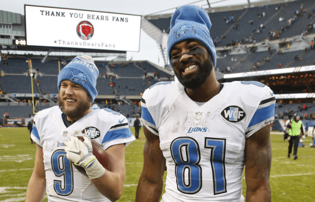 Jan 3, 2016; Chicago, IL, USA; Detroit Lions wide receiver Calvin Johnson (81) walks off the field with quarterback Matthew Stafford (9) after the NFL game against the Chicago Bears at Soldier Field. The Lions won 24-20. Mandatory Credit: Kamil Krzaczynski-Imagn Images