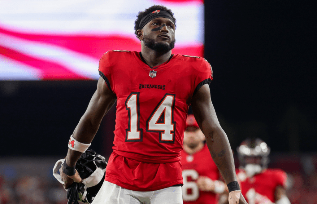 Oct 21, 2024; Tampa, Florida, USA; Tampa Bay Buccaneers wide receiver Chris Godwin (14) looks on before a game against theBaltimore Ravens at Raymond James Stadium. Mandatory Credit: Nathan Ray Seebeck-Imagn Images
