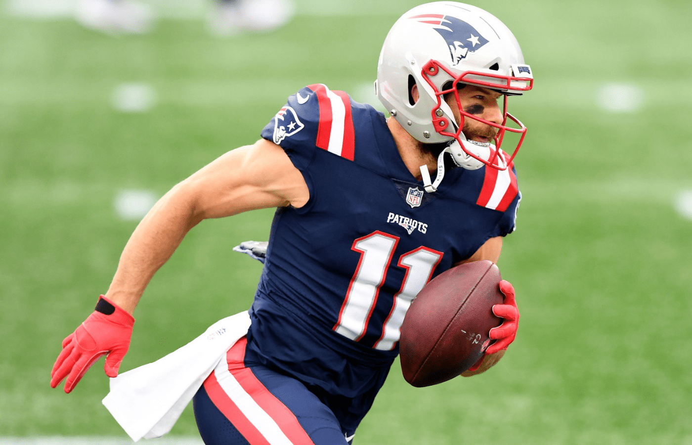 Oct 25, 2020; Foxborough, Massachusetts, USA; New England Patriots wide receiver Julian Edelman (11) runs with the ball during warmups before a game against the San Francisco 49ers at Gillette Stadium. Mandatory Credit: Brian Fluharty-Imagn Images