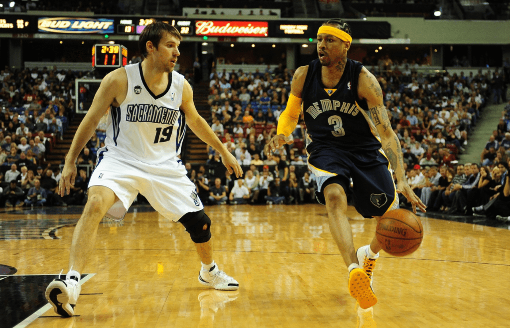 November 2, 2009; Sacramento, CA, USA; Memphis Grizzlies guard Allen Iverson (3) dribbles around Sacramento Kings guard Beno Udrih (19) during the first quarter at Arco Arena. Mandatory Credit: Kyle Terada-Imagn Images