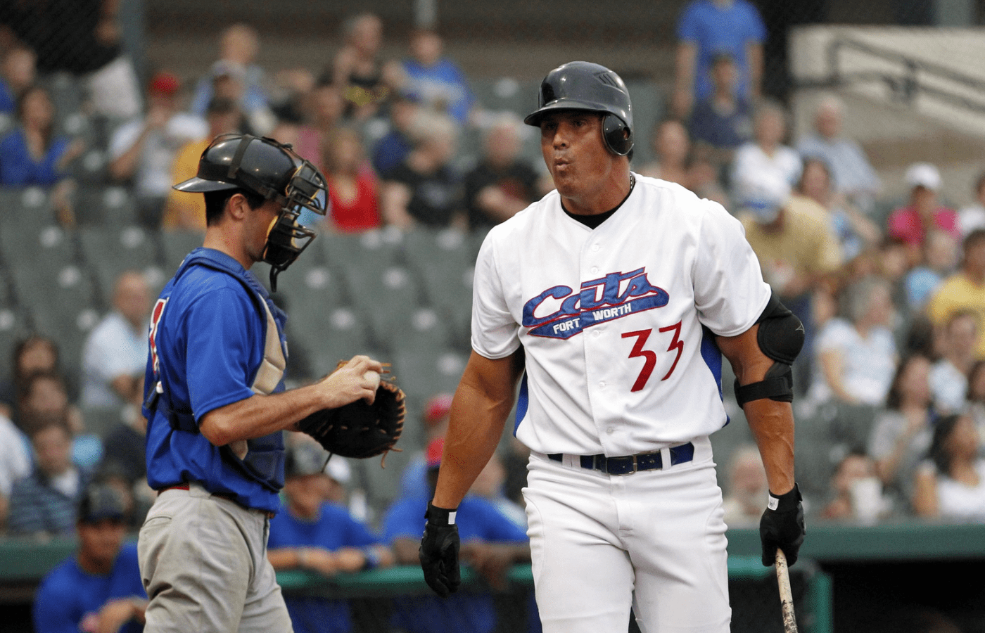 Fort Worth Cats designated hitter Jose Canseco (33) reacts to striking out in the bottom of the first inning of the game against the Edinburg Roadrunners at LaGrave Field in Fort Worth.