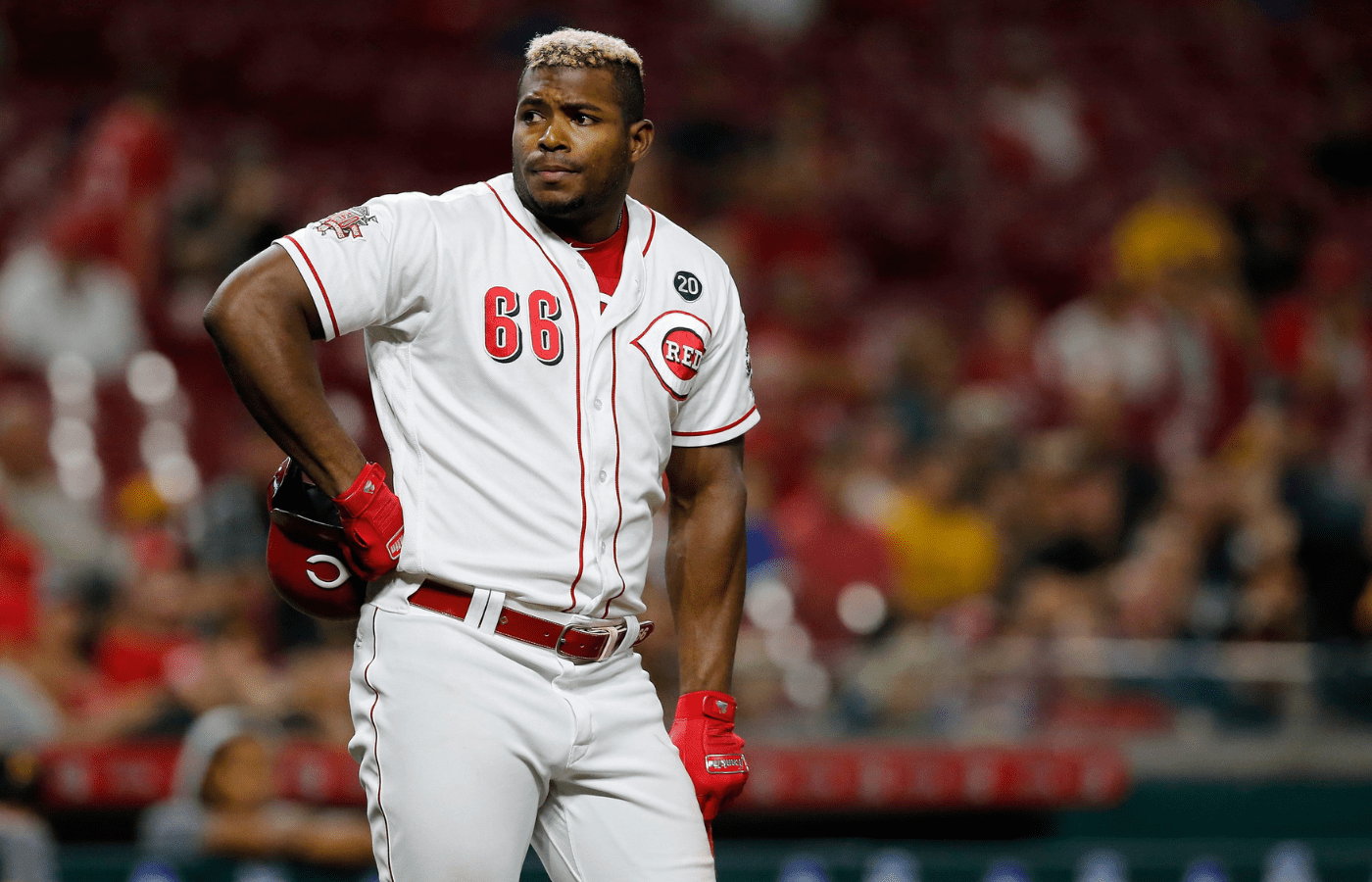 Cincinnati Reds right fielder Yasiel Puig (66) steps away from the plate as he disagrees with a called strike in the eighth inning of the MLB National League game between the Cincinnati Reds and the Pittsburgh Pirates at Great American Ball Park in downtown Cincinnati