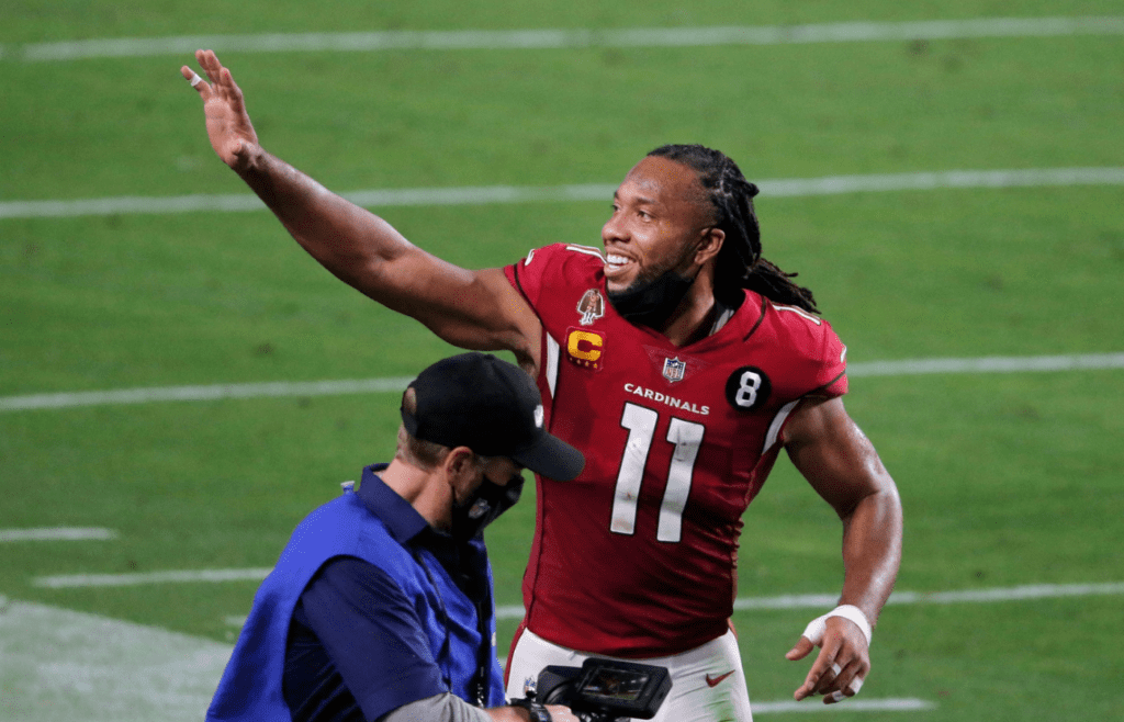 Dec 26, 2020; Glendale, AZ, USA; Arizona Cardinals wide receiver Larry Fitzgerald (11) leaves the field after finishing the last home game of the season at State Farm Stadium. Nfl San Francisco 49ers At Arizona Cardinals