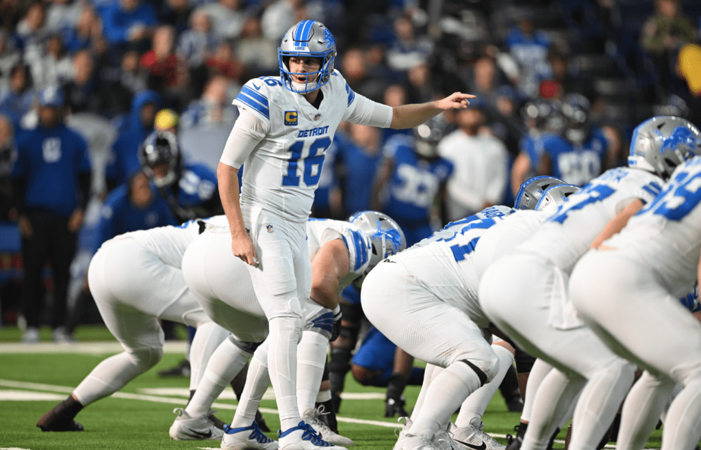Nov 24, 2024; Indianapolis, Indiana, USA; Detroit Lions quarterback Jared Goff (16) signals to his team during the second quarter against the Indianapolis Colts at Lucas Oil Stadium. Mandatory Credit: Marc Lebryk-Imagn Images