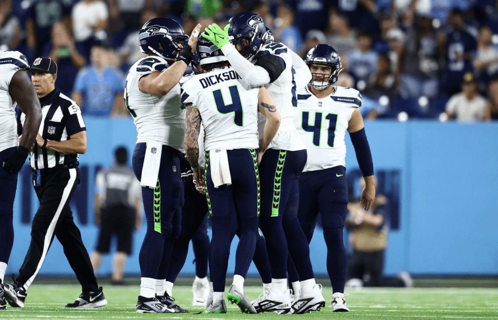 Aug 17, 2024; Nashville, Tennessee, USA; Seattle Seahawks team celebrates a field goal to take a 15-13 lead late in the game against the Tennessee Titans at Nissan Stadium. Mandatory Credit: Casey Gower-Imagn Images