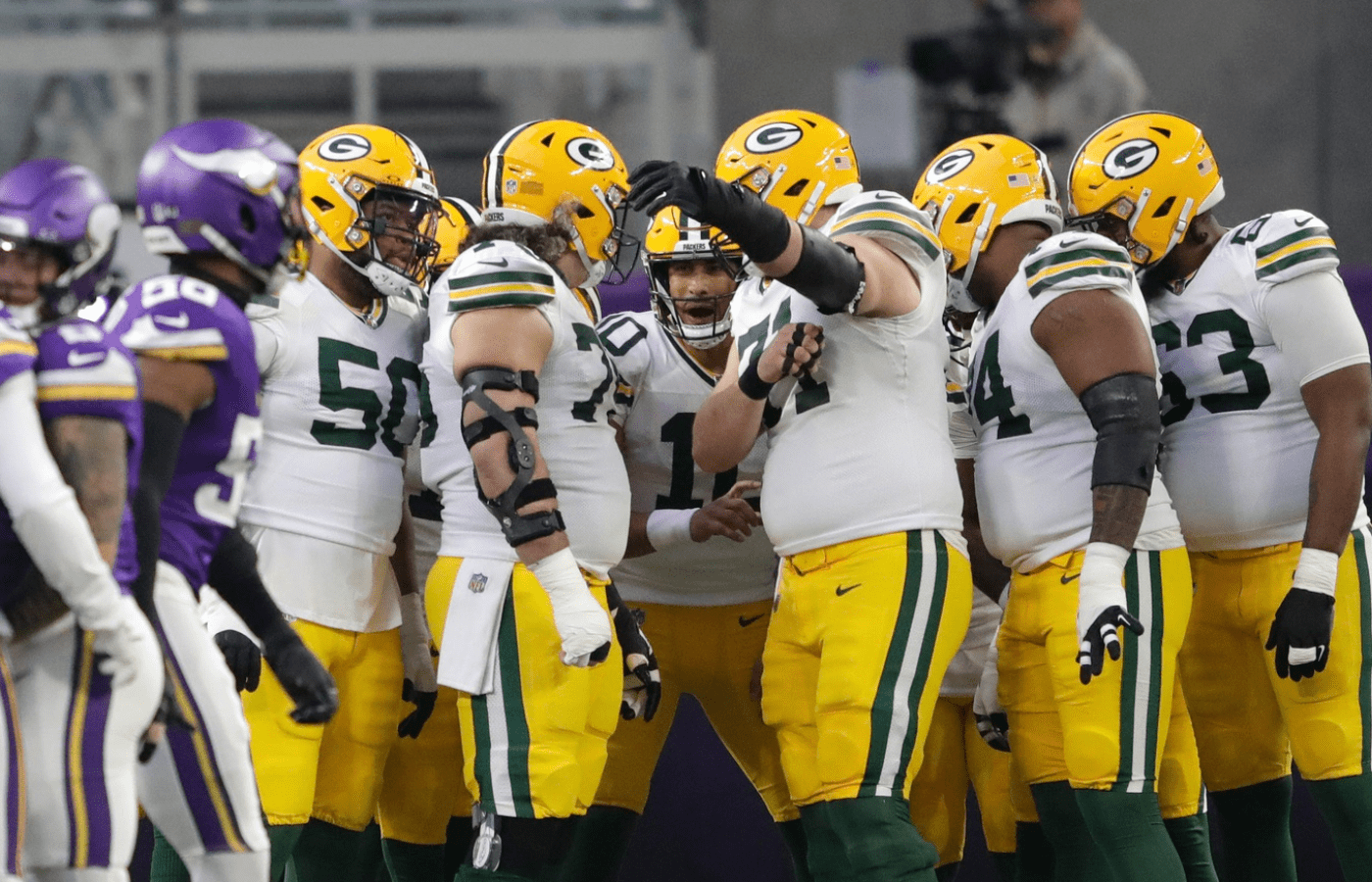 Green Bay Packers quarterback Jordan Love (10) leads his team against the Minnesota Vikings during their football game Sunday, December 29, 2024, at U.S. Bank Stadium in Minneapolis, Minnesota.