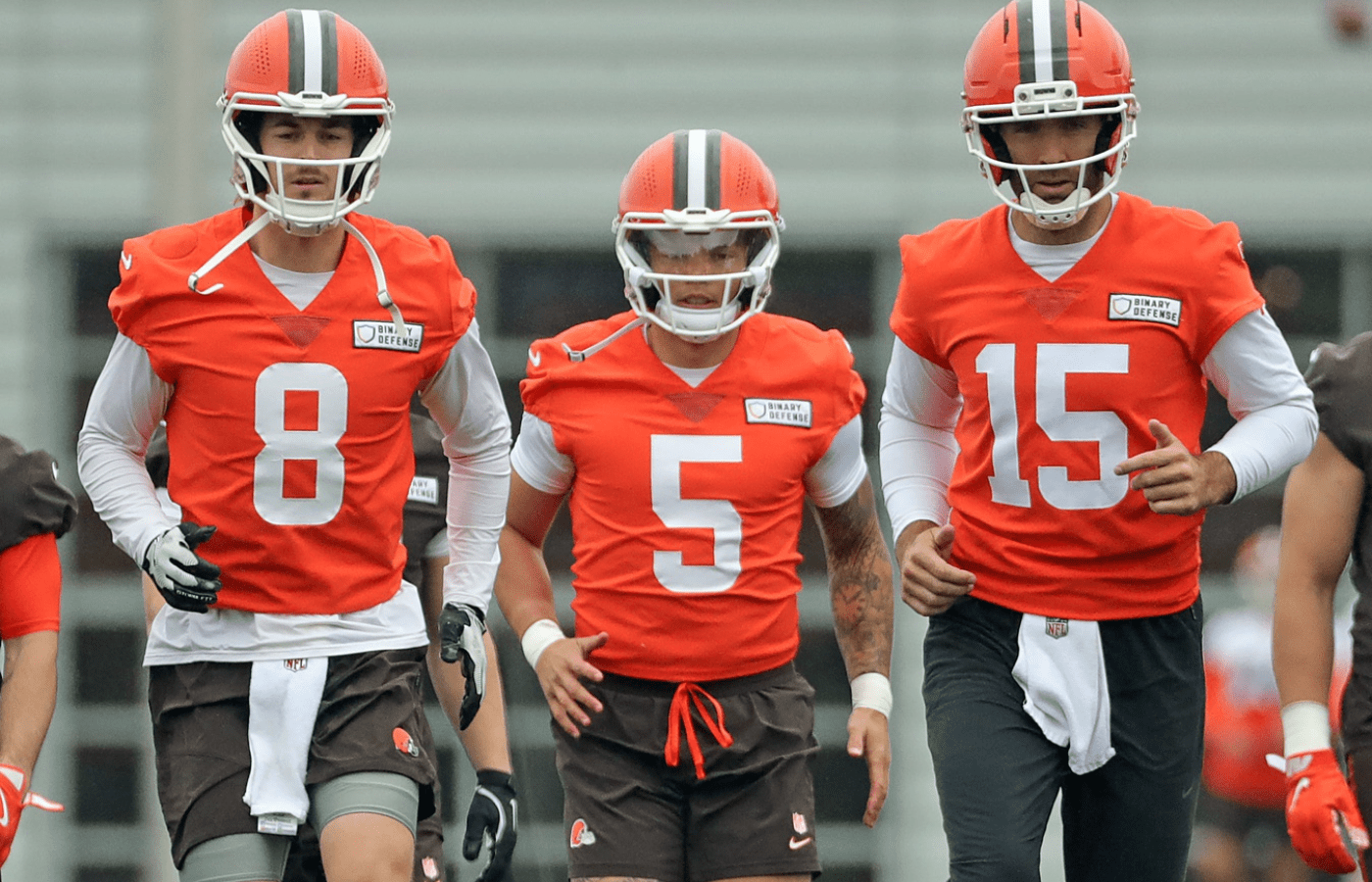 Cleveland Browns quarterbacks Kenny Pickett, left, Dillon Gabriel, center, and Joe Flacco warm up during an NFL practice at the Cleveland Browns training facility on Wednesday, May 28, 2025, in Berea, Ohio.