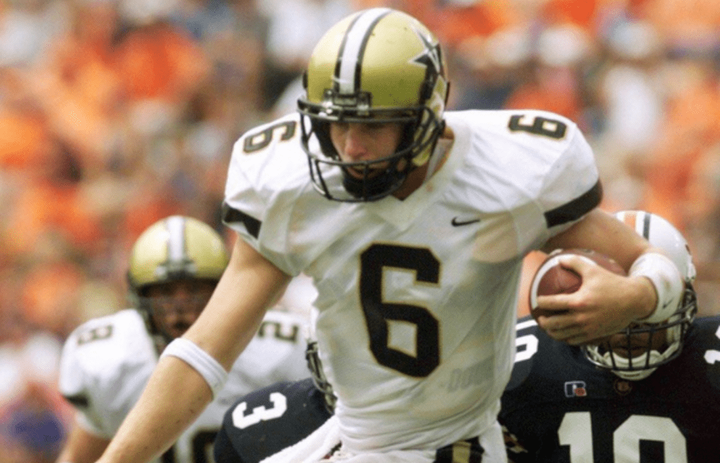 Vanderbilt quarterback Jay Cutler (6) runs for a first down against Auburn defense at Jordan-Hale Stadium in Auburn, Ala., Sept. 14, 2002. Cutler Rushed for 32 yards, but Auburn came out on top 31-6. 091402 Vu Fb Auburn