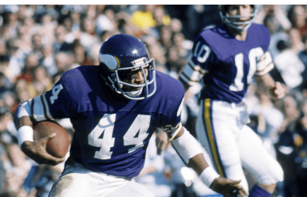 Jan 9, 1977; Pasadena, CA, USA; FILE PHOTO; Minnesota Vikings running back Chuck Foreman (44) in action against the Oakland Raiders during Super Bowl XI at the Rose Bowl. The Raiders defeated the Vikings 32-14 giving the Raiders their first Super Bowl championship. Mandatory Credit: Malcolm Emmons-Imagn Images