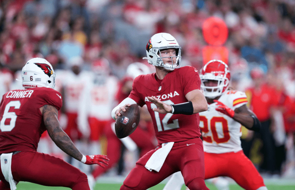 Aug 19, 2023; Glendale, Arizona, USA; Arizona Cardinals quarterback Colt McCoy (12) throws a pass against the Kansas City Chiefs during the first half at State Farm Stadium. Mandatory Credit: Joe Camporeale-Imagn Images