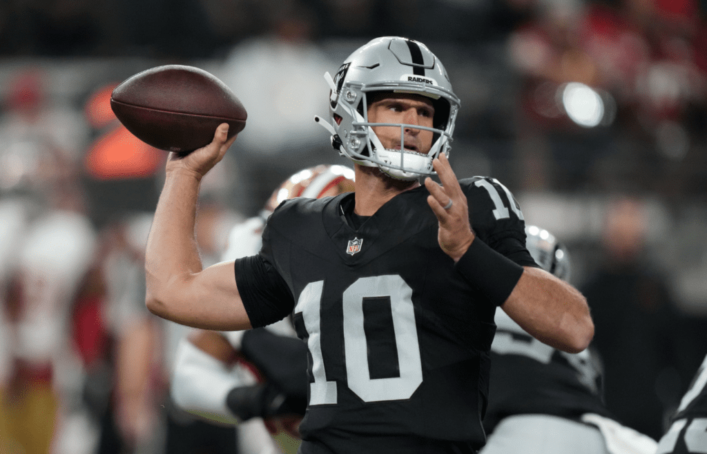 Aug 23, 2024; Paradise, Nevada, USA; Las Vegas Raiders quarterback Nathan Peterman (10) throws the ball against the San Francisco 49ers in the first half at Allegiant Stadium. Mandatory Credit: Kirby Lee-Imagn Images
