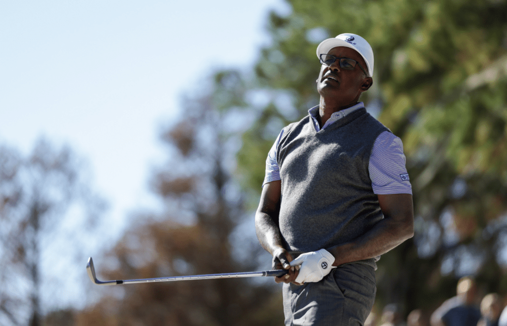 Dec 22, 2024; Orlando, Florida, [USA]; Vijay Singh hits a shot out of a bunker on the seventh hole during the PNC Championship at The Ritz-Carlton Golf Club. Mandatory Credit: Nathan Ray Seebeck-Imagn Images