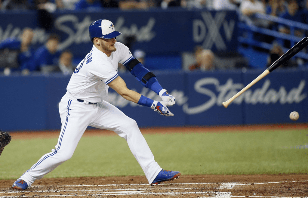 Apr 13, 2017; Toronto, Ontario, CAN; Toronto Blue Jays designated hitter Josh Donaldson (20) loses his bat on a ground ball hit to Baltimore Orioles third baseman Manny Machado (not pictured) during the fourth inning at Rogers Centre. Mandatory Credit: John E. Sokolowski-Imagn Images