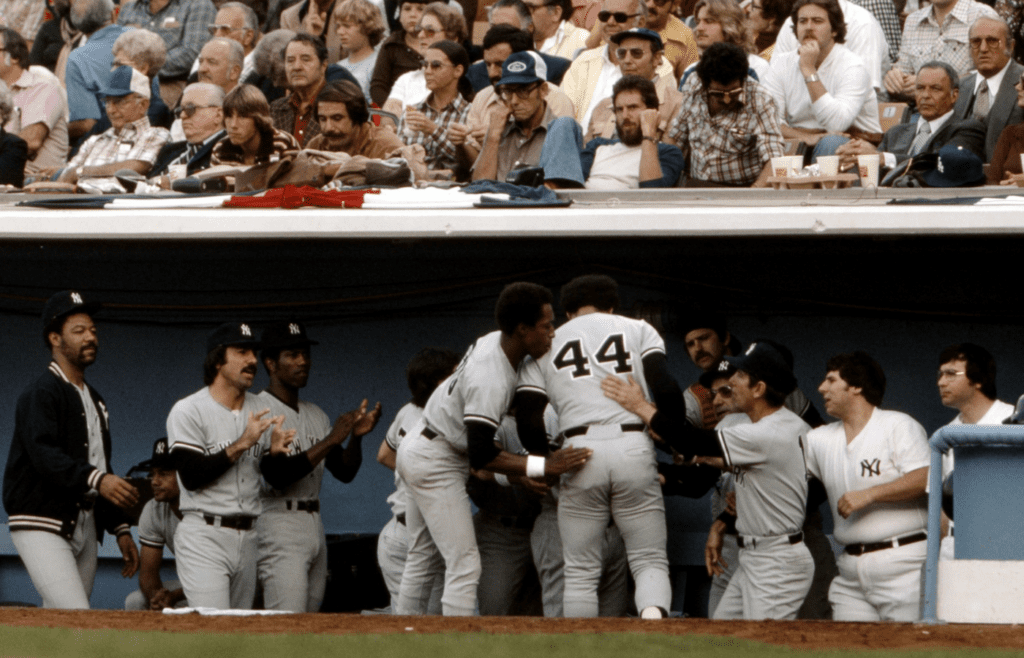 Oct 15, 1977; Los Angeles, CA, USA FILE PHOTO; New York Yankees outfielder Reggie Jackson (44) is congratulated at the dugout by Billy Martin (right) after hitting a home run against the Los Angeles Dodgers during the 1977 World Series at Dodger Stadium. The Yankees defeated the Dodgers 4 games to 2. Mandatory Credit: Dick Raphael-Imagn Images
