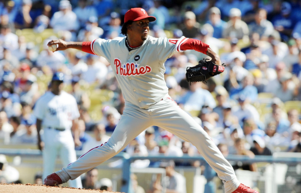 October 16, 2009; Los Angeles, CA, USA; Philadelphia Phillies starting pitcher Pedro Martinez (45) throws during the first inning of game two of the 2009 NLCS against the Los Angeles Dodgers at Dodger Stadium. Mandatory Credit: Christopher Hanewinckel-Imagn Images