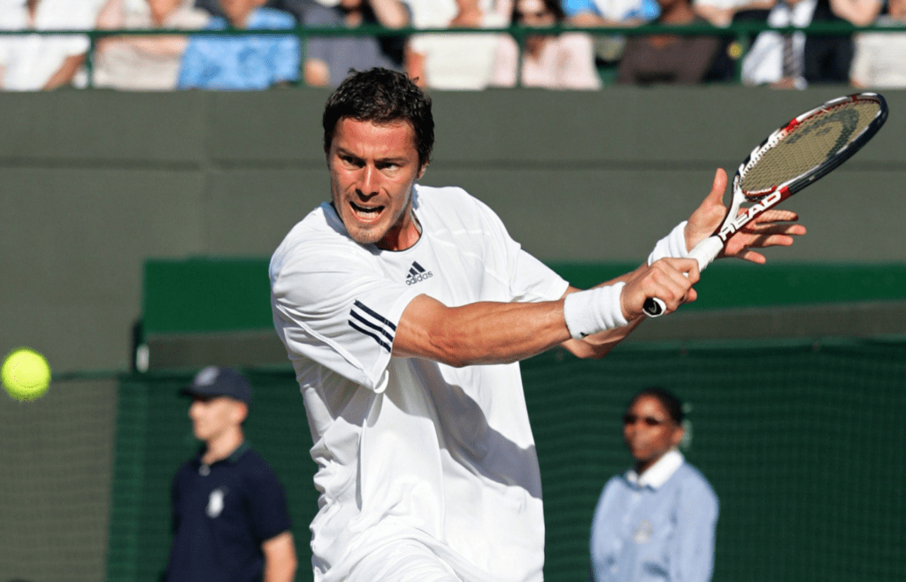 Jul 2, 2008; London, ENGLAND; Marat Safin (RUS) returns a shot against Feliciano Lopez (not pictured) during the quarter finals of the 2008 Wimbledon Championships at the All England Lawn and Tennis Club. Safin defeated Lopez 3-6, 7-5, 7-6, 6-3. Mandatory Credit: Alan Grieves/GEPA via Imagn Images