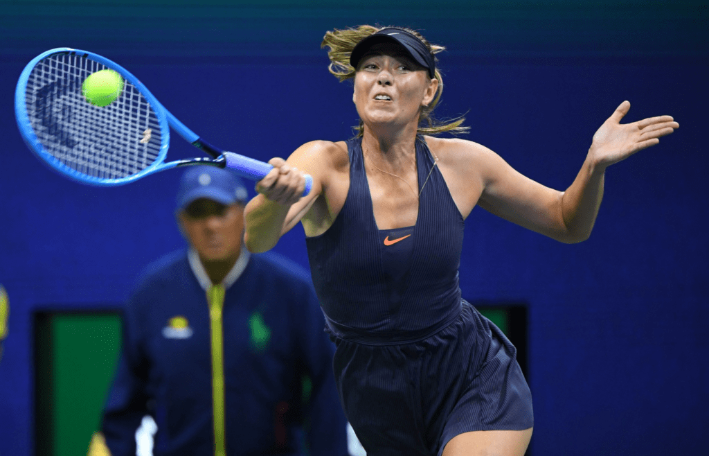 Aug 26, 2019; Flushing, NY, USA; Maria Sharapova of Russia hits to Serena Williams of the USA in the first round on day one of the 2019 U.S. Open tennis tournament at USTA Billie Jean King National Tennis Center. Mandatory Credit: Robert Deutsch-Imagn Images