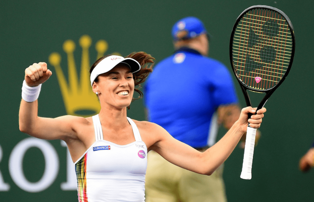Mar 18, 2017; Indian Wells, CA, USA; L-R: Martina Hingis (SUI) celebrates match point as she and partner Yung-Jan Chan (not pictured) celebrate winning the doubles final at the BNP Paribas Open at the Indian Wells Tennis Garden. Mandatory Credit: Jayne Kamin-Oncea-Imagn Images