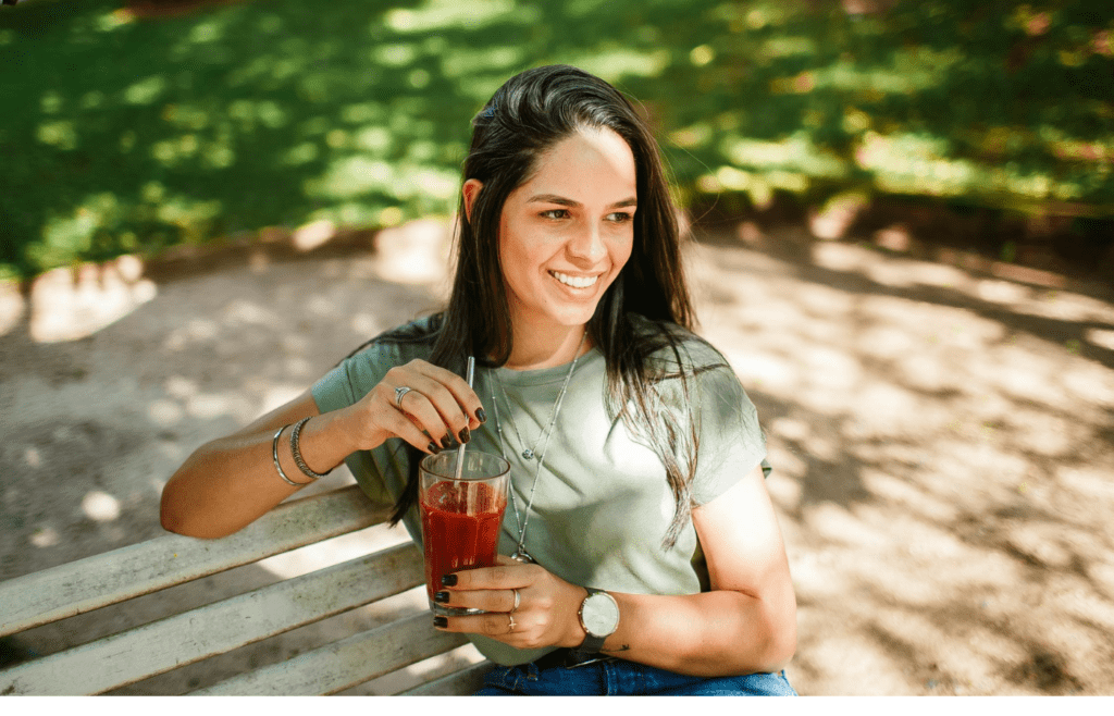 A person enjoying a warm drink or watching the sunrise