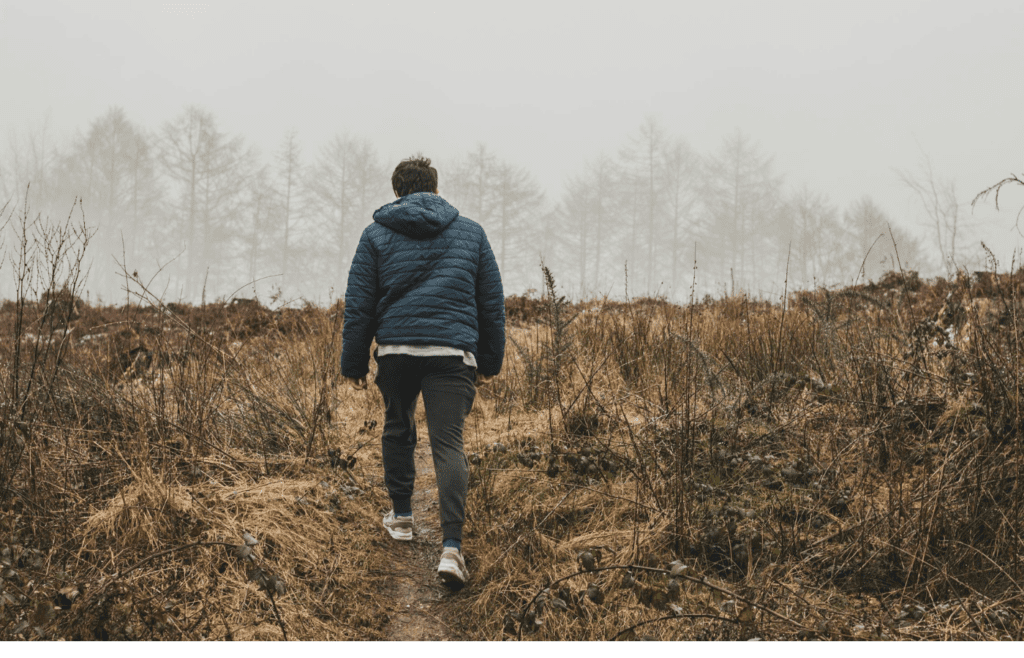 A person walking on a winding path or trail