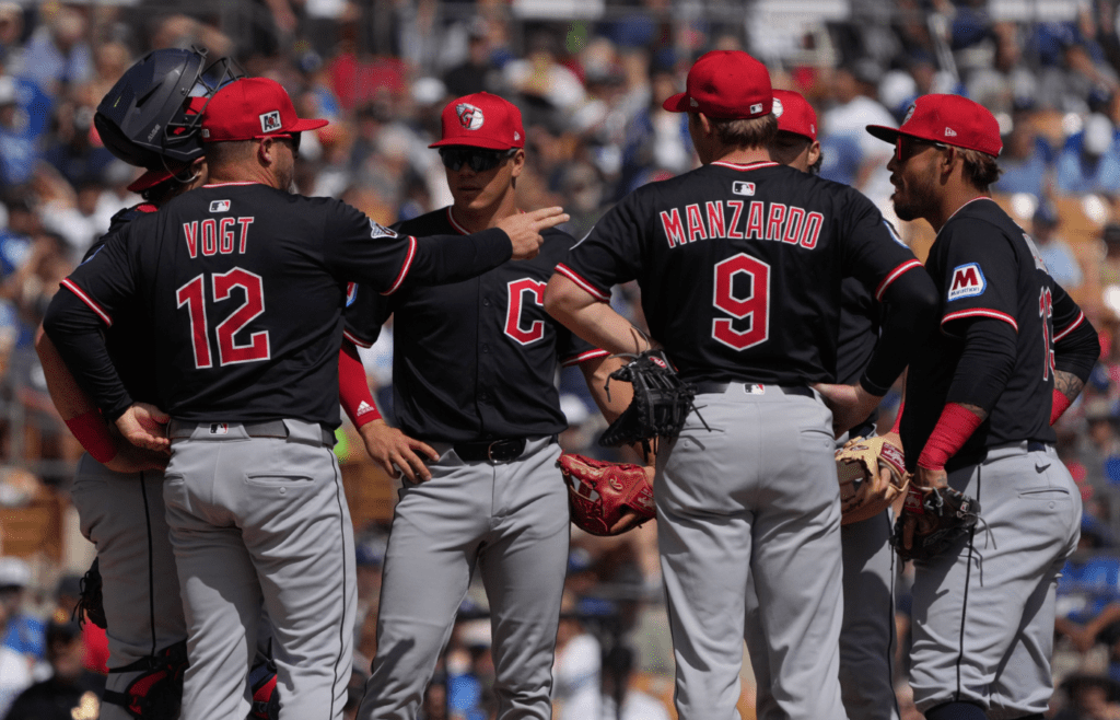 Mar 11, 2025; Phoenix, Arizona, USA; Cleveland Guardians manager Stephen Vogt (12) talks to his team in the first inning against the Los Angeles Dodgers at Camelback Ranch-Glendale. Mandatory Credit: Rick Scuteri-Imagn Images