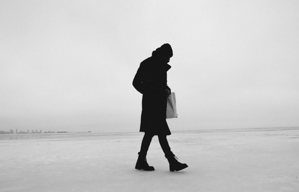A person walking away with a sense of relief