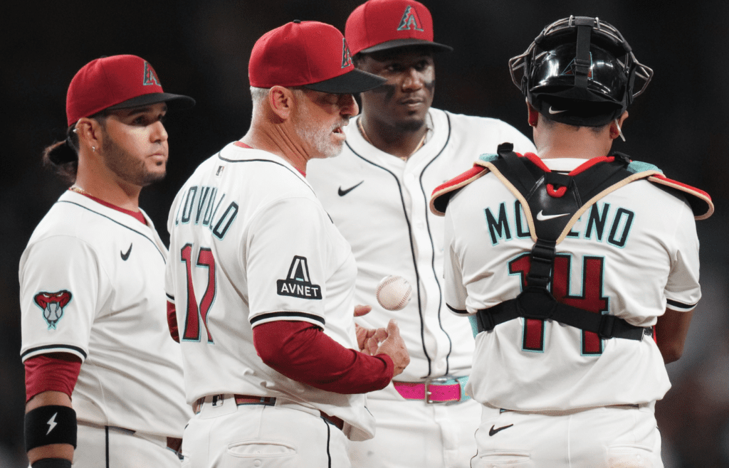 Arizona Diamondbacks head coach Torey Lovullo walks out to the mound to talk to his team during their Opening Day game against the Chicago Cubs at Chase Field in Phoenix on March 27, 2025