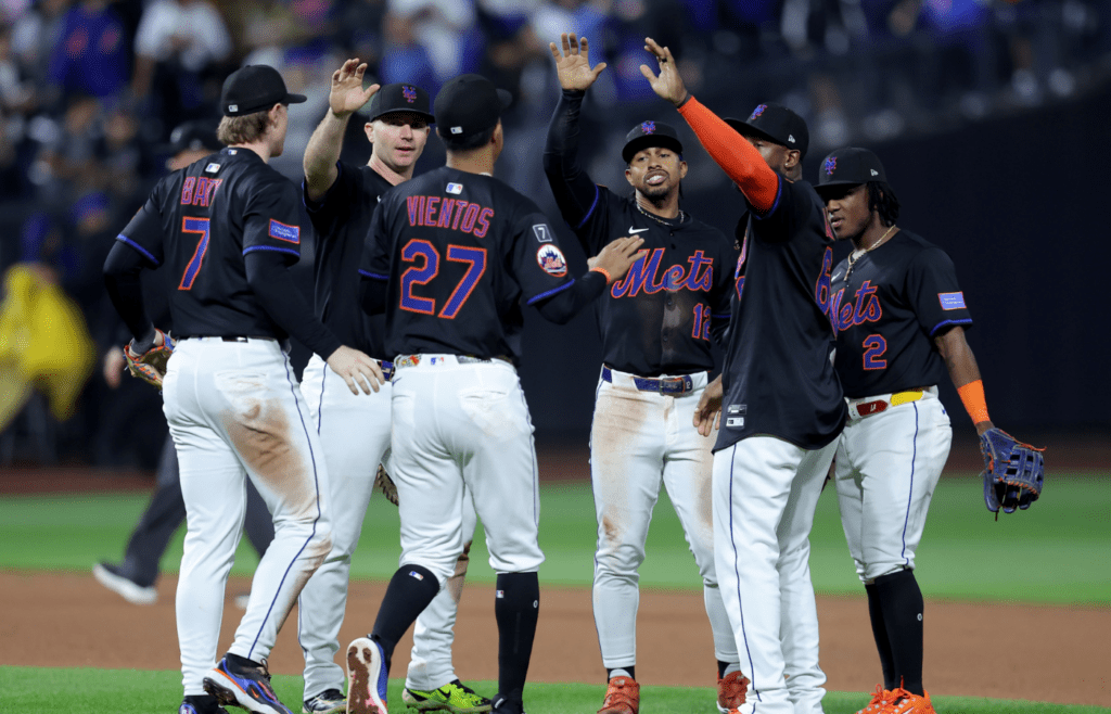 May 30, 2025; New York City, New York, USA; New York Mets infielders celebrate after defeating the Colorado Rockies at Citi Field. Mandatory Credit: Brad Penner-Imagn Images