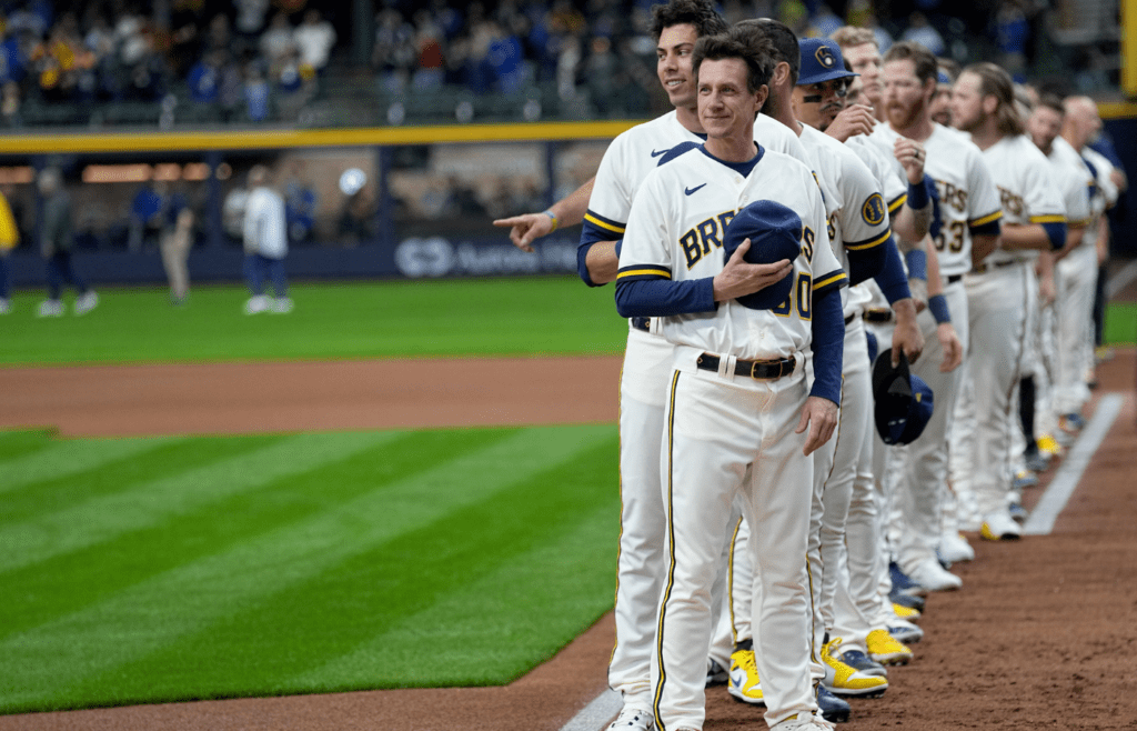 Milwaukee Brewers manager Craig Counsell (30) stands with his team for the National Anthem before their home opener against the New York Mets Monday, April 3, 2023, at American Family Field in Milwaukee, Wis.
