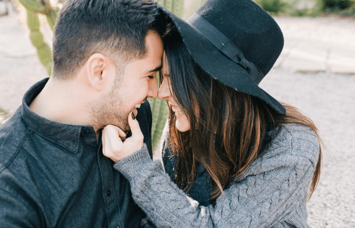 A couple smiling warmly at each other