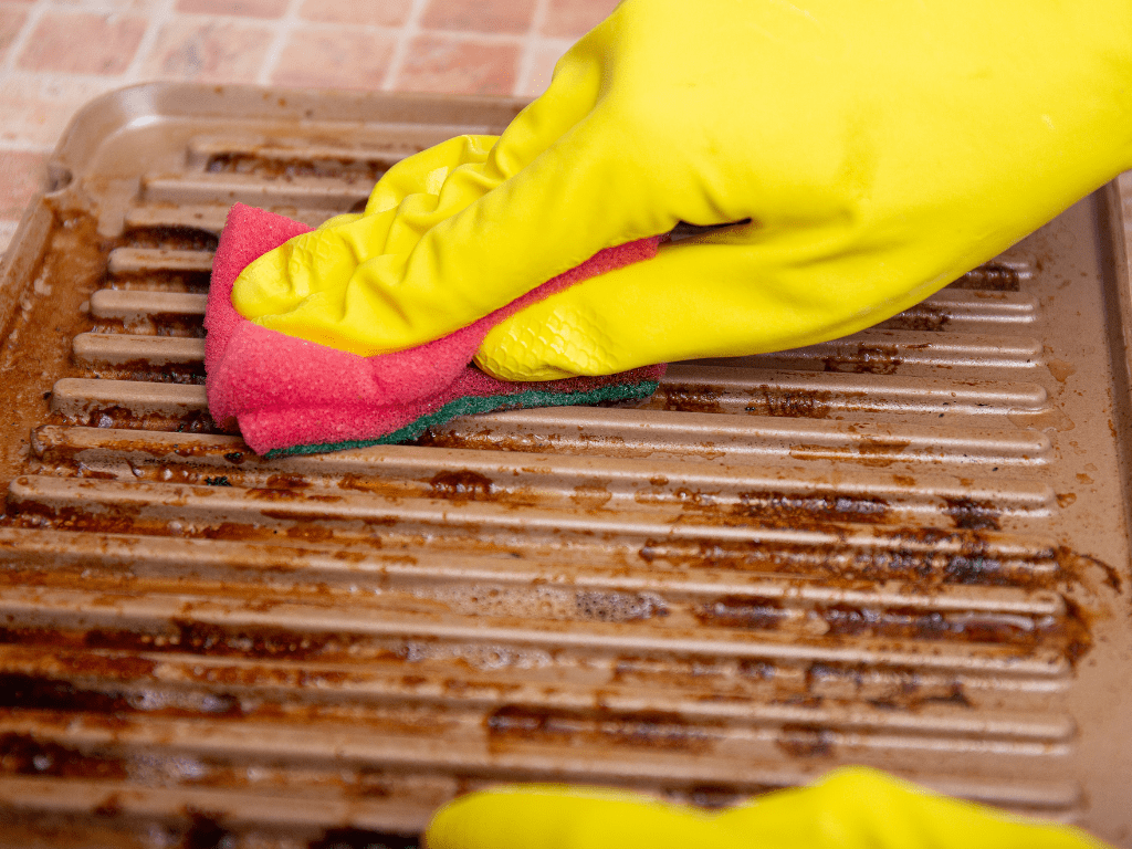 cleaning grill with gloves