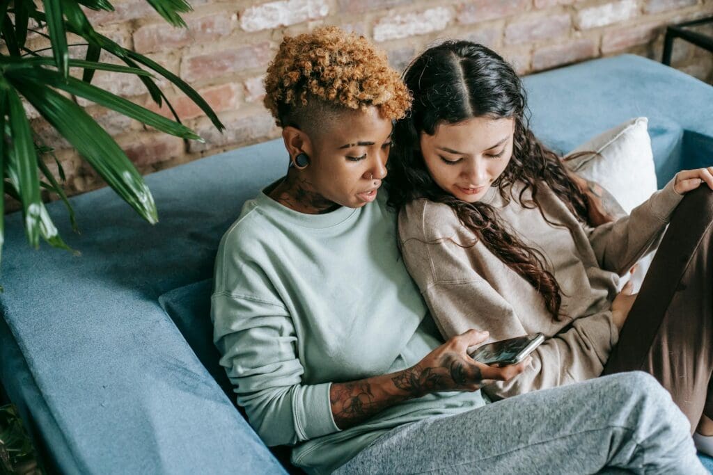 A couple scrolling social media together