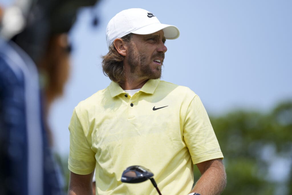 Jun 1, 2025; Dublin, Ohio, USA; Tommy Fleetwood watches his shot from the first tee during the final round of the Memorial Tournament presented by Workday golf tournament.