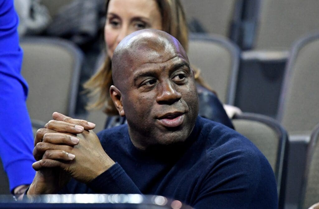 Mar 23, 2018; Omaha, NE, USA; NBA former player Magic Johnson watches during the first half between the Clemson Tigers and the Kansas Jayhawks in the semifinals of the Midwest regional of the 2018 NCAA Tournament at CenturyLink Center. Mandatory Credit: Kyle Terada-USA TODAY Sports