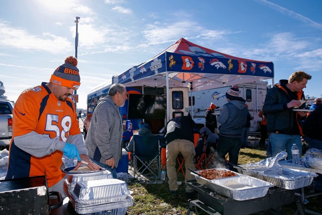 Dec 1, 2019; Denver, CO, USA; Denver Broncos fans tailgate before the game against the Los Angeles Chargers at Empower Field at Mile High. Mandatory Credit: Isaiah J. Downing-USA TODAY Sports