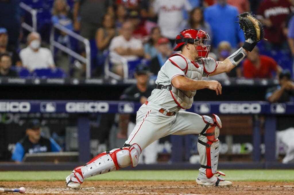 Jul 15, 2022; Miami, Florida, USA; Philadelphia Phillies catcher J.T. Realmuto (10) catches the ball to retire Miami Marlins pinch runner Billy Hamilton (not pictured) during the ninth inning at loanDepot Park. Mandatory Credit: Sam Navarro-USA TODAY Sports