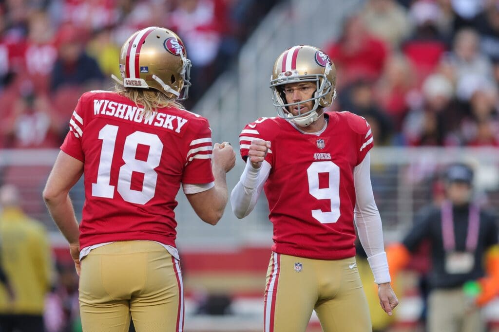 Dec 24, 2022; Santa Clara, California, USA; San Francisco 49ers place kicker Robbie Gould (9) celebrates with punter Mitch Wishnowsky (18) after connecting on a field goal during the fourth quarter against the Washington Commanders at Levi's Stadium. Mandatory Credit: Sergio Estrada-USA TODAY Sports