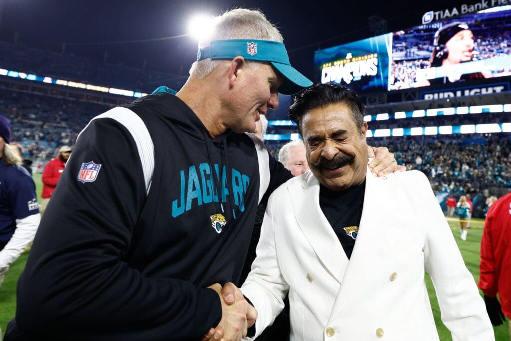 Jan 7, 2023; Jacksonville, Florida, USA; Jacksonville Jaguars owner Shahid Khan (white jacket) reacts after defeating the Tennessee Titans to win the AFC South Division at TIAA Bank Field. Mandatory Credit: Douglas DeFelice-USA TODAY Sports