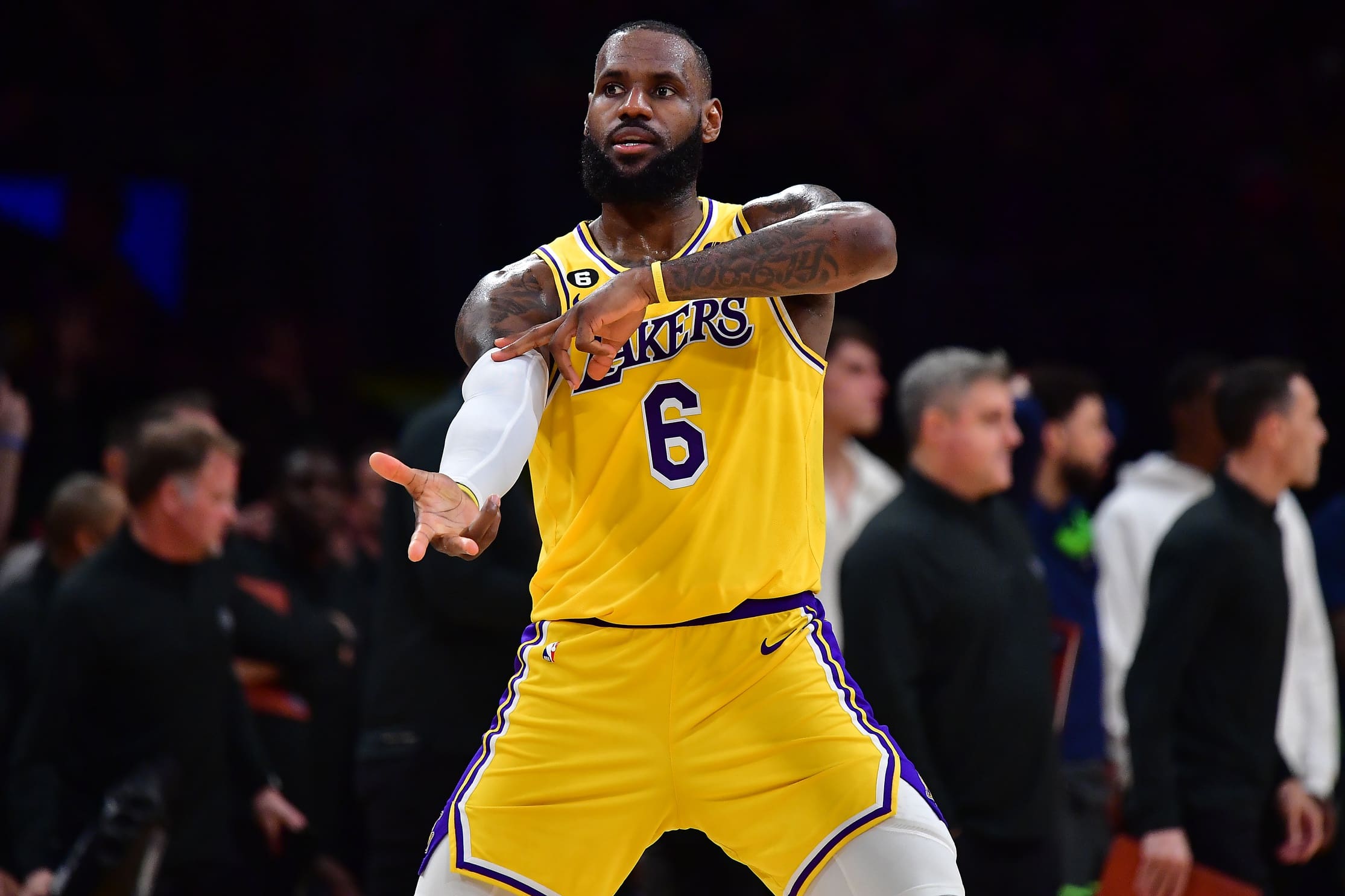 Apr 11, 2023; Los Angeles, California, USA; Los Angeles Lakers forward LeBron James (6) reacts after Los Angeles Lakers guard Dennis Schroder (17) scores a three poibt basket against the Minnesota Timberwolves during the second half at Crypto.com Arena. Mandatory Credit: Gary A. Vasquez-USA TODAY Sports