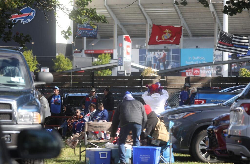 People bundle up against the morning cold before the start of the Buffalo Bills home opener at Highmark Stadium in Orchard Park on Sept. 8, 2024.