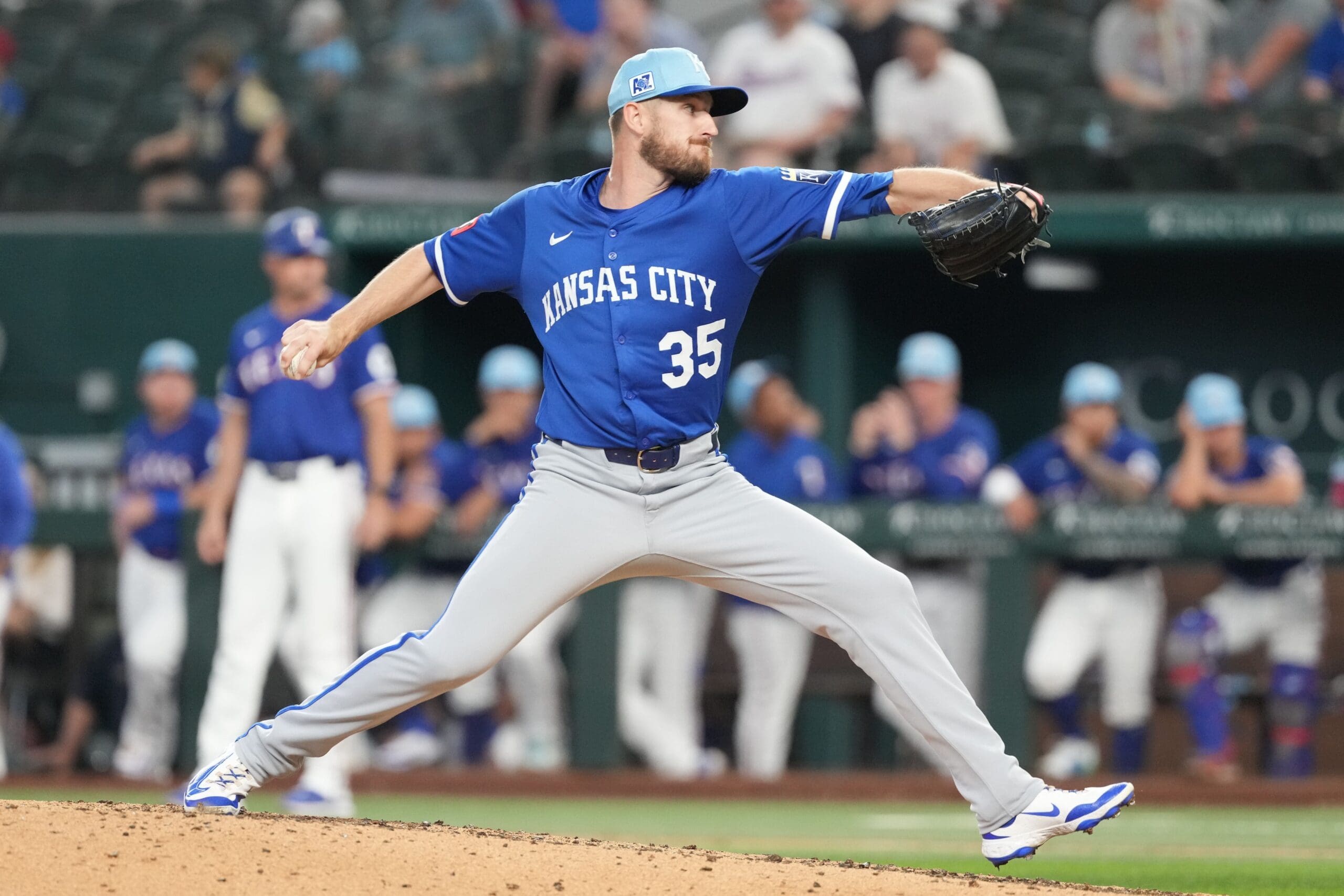 Mar 25, 2025; Arlington, Texas, USA; Kansas City Royals relief pitcher Chris Stratton (35) delivers a pitch to the Texas Rangers during the sixth inning at Globe Life Field. Mandatory Credit: Jim Cowsert-Imagn Images