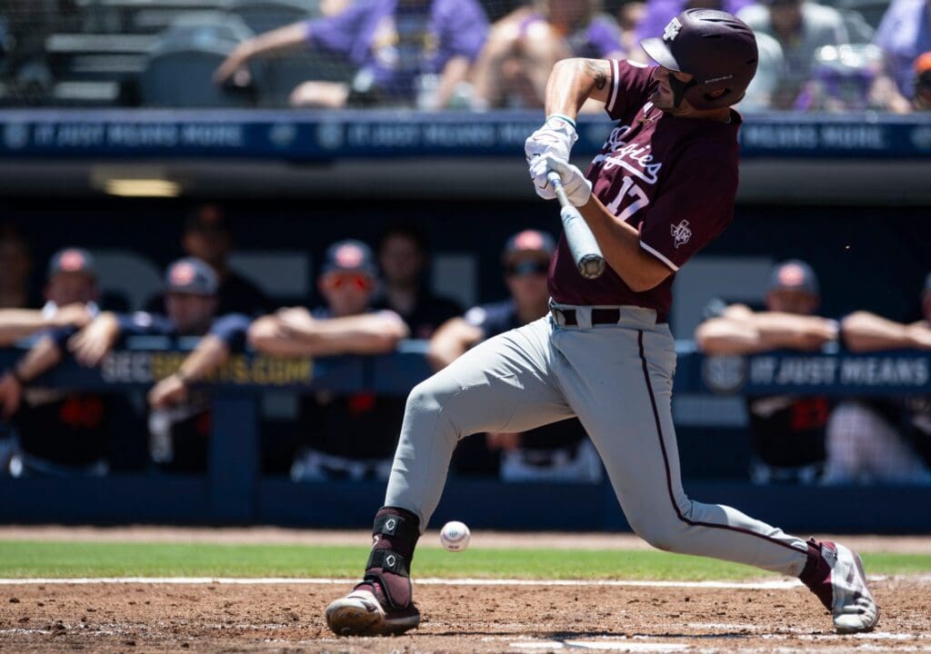 Texas A&M Aggies' Jace LaViolette (17) is hit in the hands by a pitch as Auburn Tigers take on Texas A&M Aggies during the SEC baseball tournament at Hoover Met in Birmingham, Ala., on Thursday, May 22, 2025.